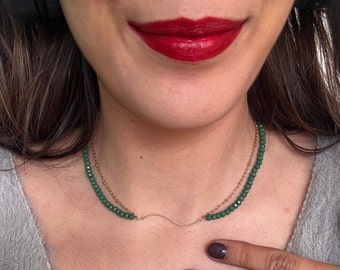 Double row stainless steel necklace and emerald green crystal bead with gold pendant