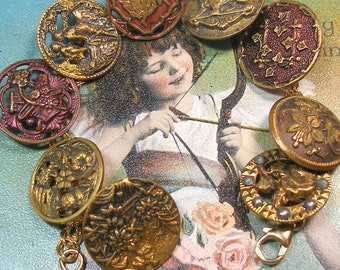 Cupids Garden Antique BUTTON charm bracelet. Victorian Eros & flowers on gold. 7" Antique button jewelry. 9 buttons