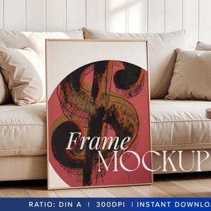 May include: A framed mockup with a pink background and a black and gold abstract design. The text "Frame Mockup" is written in white on the image.
