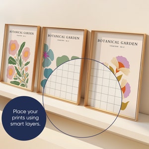 May include: Three framed prints with a gold frame and white matting. Each print features a different floral design with a botanical garden theme. The text "Botanical Garden" is printed at the top of each print.