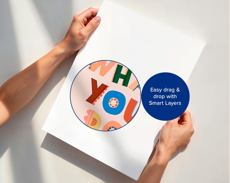 May include: A white poster held by two hands, featuring a colorful circular design with the words "WHAT YOU". A blue circle with white text reads "Easy drag & drop with Smart Layers".