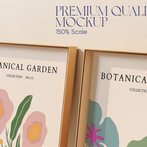 May include: Two framed prints with gold frames, each featuring a botanical illustration with the text "Botanical Garden" and a collection number. The print on the left features pink flowers and green leaves, while the print on the right features pink, green, and blue flowers and leaves.