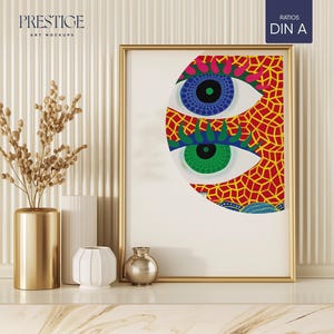 Puede incluir: Una impresión enmarcada en dorado con un fondo blanco y un diseño abstracto colorido de dos ojos. Los ojos son rojos, azules, verdes y amarillos. El diseño tiene forma de semicírculo.