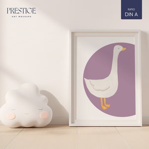 May include: A white framed print with a purple background and a white goose illustration. The goose is standing on a purple circle. The print is on a white wall with a white cloud-shaped pillow in the foreground.