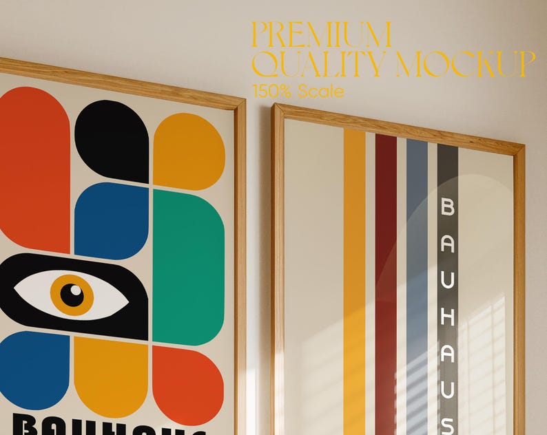 May include: Two framed prints hanging on a wall. The print on the left features a colorful abstract design with a large eye in the center. The print on the right features a vertical striped design with the word "BAUHAUS" in white letters.