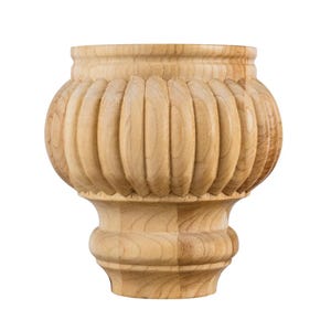 May include: A light-colored, unfinished wooden furniture leg featuring a rounded, bulbous top section with vertical fluted carvings and a smaller, smooth, rounded base. The wood grain is visible throughout the surface of this turned wooden component.