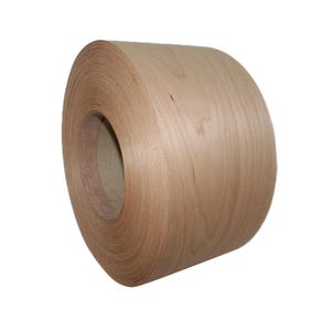 May include: A continuous roll of light brown wood veneer tape featuring a smooth, natural grain pattern. The roll is tightly wound around a central cardboard core, displaying a consistent tan color and a thin, flexible profile throughout the coil.