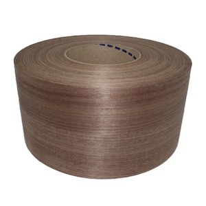May include: A roll of brown wood veneer tape. The tape is wound around a cardboard core.