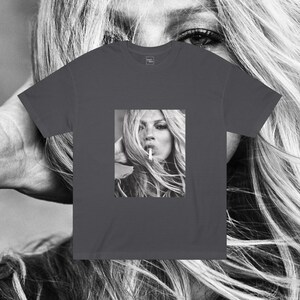 May include: A dark gray t-shirt with a black and white photo of a woman with long hair smoking a cigarette.