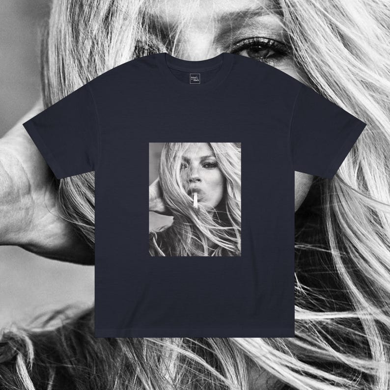 May include: A navy blue t-shirt with a black and white photo of a woman with long blonde hair smoking a cigarette.