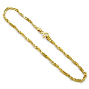 May include: A gold-toned chain bracelet with a twisted rope design. The bracelet has a lobster clasp closure.