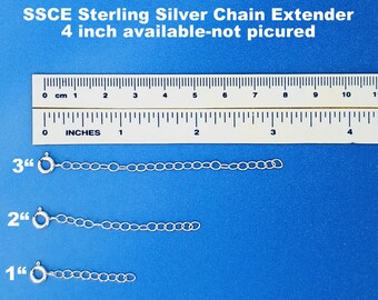 May include: Three sterling silver chain extenders, measuring 1 inch, 2 inches, and 3 inches in length, are laid out on a blue surface next to a ruler.  SSCE Sterling Silver Chain Extender 4 inch available-not pictured