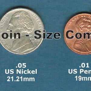 May include: A size comparison chart of US coins, showing a quarter, nickel, penny, and dime. The coins are arranged from largest to smallest, with their denominations and diameters listed below each coin.