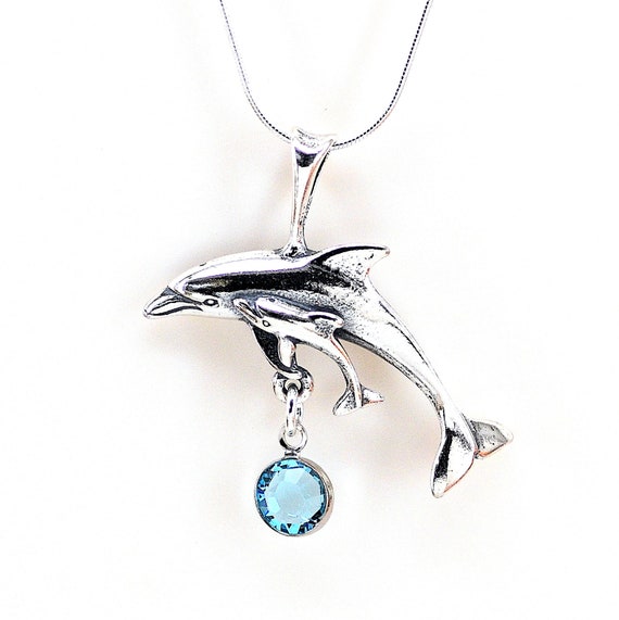 Dolphin with Baby Calf Sterling Silver Antiqued Finish Dolphin with Baby Calf Sterling Silver Antiqued Finish