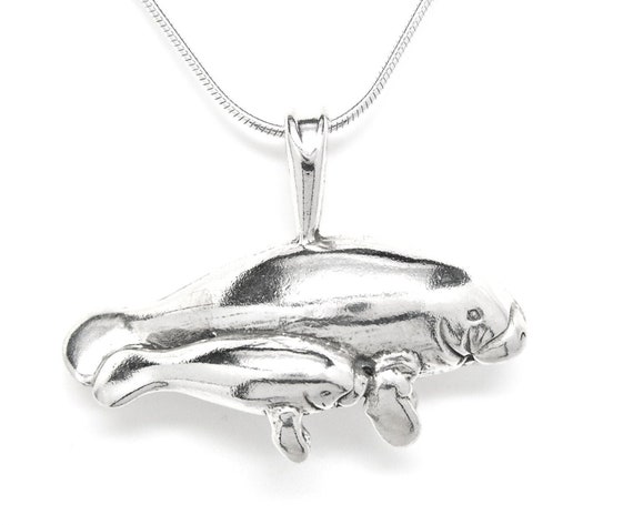 Dolphin with Baby Calf Sterling Silver Antiqued Finish Dolphin with Baby Calf Sterling Silver Antiqued Finish