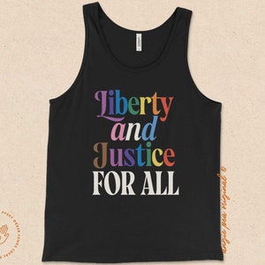 May include: Black tank top with the text "Liberty and Justice For All" in rainbow colors.