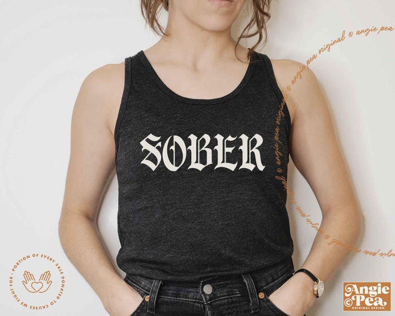 May include: A black tank top with the word "SOBER" printed in white gothic lettering.