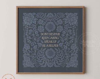 May include: Square framed print with a floral design in shades of blue and gray. The print features the words "DON'T DESPAIR KEEP CARING SPEAK UP BE A HELPER" in a stylized font. The frame is made of wood.