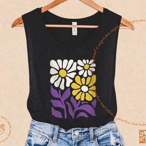 May include: Black tank top with a graphic of purple flowers and yellow daisies. The flowers are stylized and have a retro look.