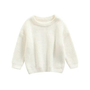 May include: A cream-colored, knitted sweater with a crew neck and long sleeves. The sweater has a ribbed texture and a relaxed fit. This cozy knitwear is suitable for casual wear.