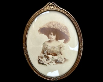 Oval Gold Toned Framed Edwardian Woman Wearing a Large Hat Holding Flowers