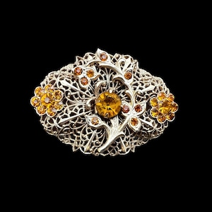 Vintage Gold Tone Brooch With Yellowish Amber Colored Rhinestones