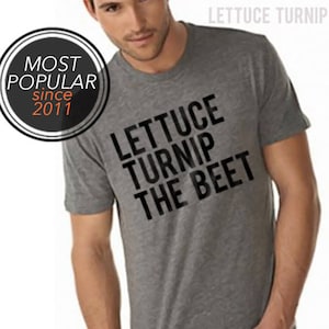May include: A grey t-shirt with the text "Lettuce Turnip The Beet" printed in black. The shirt is a popular item, as indicated by the "Most Popular Since 2011" badge.