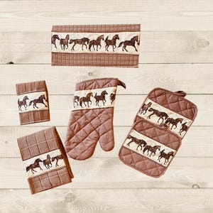 May include: Set of brown quilted kitchen towels and pot holders with a pattern of brown horses. The towels and pot holders have a quilted texture and are decorated with a repeating pattern of brown horses.