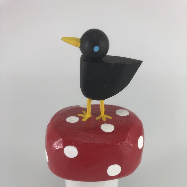pájaro en un hongo