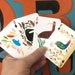 Mikayle Stole reviewed Playing Card Deck with 54 hand cut bird collages on each card face- great for family camping or road trip