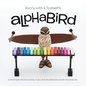 Alphabird | alphabet book featuring handmade sculptures of birds | 26 species and musical instruments with educational glossary in back