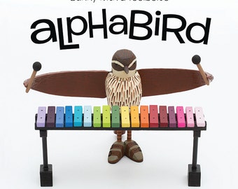 Alphabird | alphabet book featuring handmade sculptures of birds | 26 species and musical instruments with educational glossary in back