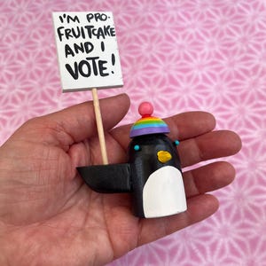 penguins with rainbow hats | holiday decoration tablescape | christmas gift stocking stuffer | folk art wood sculpture image 7