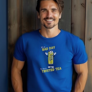 May include: A blue t-shirt with a graphic of a cartoon Twisted Tea can with the text "It's a bad day to be a Twisted Tea".