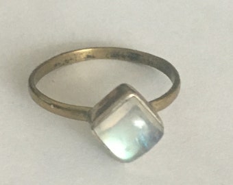 Moonstone solitaire ring -Size 8 -oval gemstone in gold basel setting on 2.5 mm wide sterling sivler band- healing stone