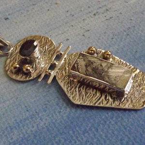 Psychic&#39;s stone Gibeon Meteorite and Black Onyx sterling silver pendant