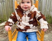 Youth cow printed sherpa pullover