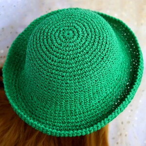 May include: A set of three ceramic mugs with a speckled, matte finish. The mugs are in shades of cream, light brown, and dark brown. Each mug has a simple, minimalist design, perfect for coffee or tea.