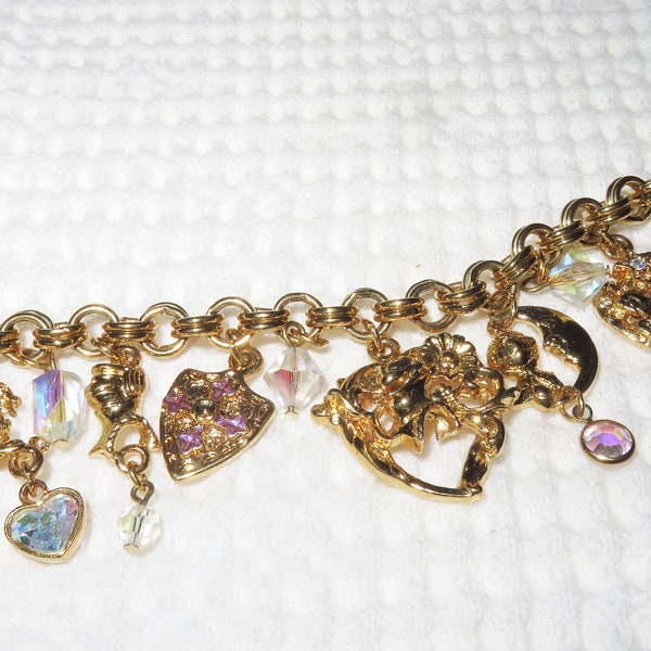 Vintage Kirks Folly Legend of the Heart Charm Bracelet 1990s Retired Very Good Vintage Condition Goldtone