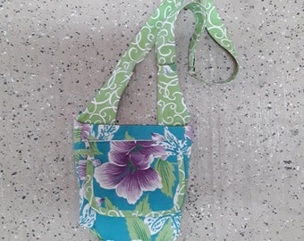 Cheery summer floral print SeaDebris Multi-pocket Crossbody Bag in teal, purple and green