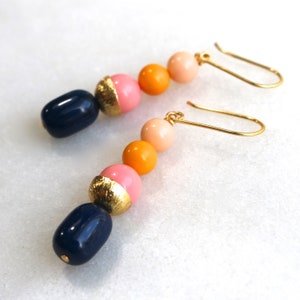 The Modern Drop Earring in Apatite and Pastel Shell Pearls in Gold Vermeil...