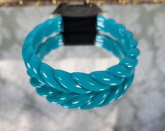 Pulsera vintage de plástico de lucita grueso, color azul verdoso, con giro, años 70/80, Alemania Occidental