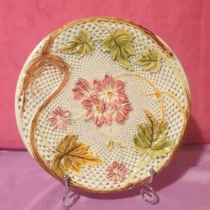 Antique majolica slip plate with floral decoration