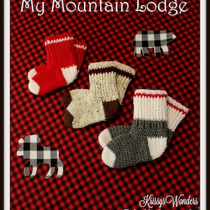 May include: Three pairs of crocheted socks in red, beige, and gray with white accents. The socks are on a red and black checkered background with a black and white bear and moose cutout.