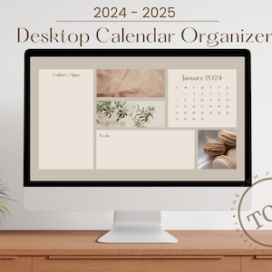 May include: A computer monitor displaying a desktop calendar organizer for the year 2024. The calendar is for January and has a beige background. The monitor is on a wooden desk with a small plant in a white pot.