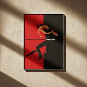Puede incluir: Una impresión artística enmarcada que presenta una ilustración estilizada de una pareja bailando tango. La obra de arte está dividida verticalmente, con un fondo rojo a la izquierda y negro a la derecha. Se incluye el texto "YOUR FIGHT CAN TURN INTO A CELEBRATION."