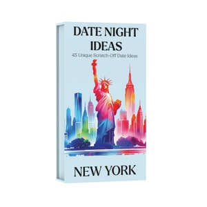 May include: A blue box with a colorful illustration of the Statue of Liberty and the New York City skyline. The box says "Date Night Ideas" and "45 Unique Scratch-Off Date Ideas" in black text. The bottom of the box says "New York" in black text.