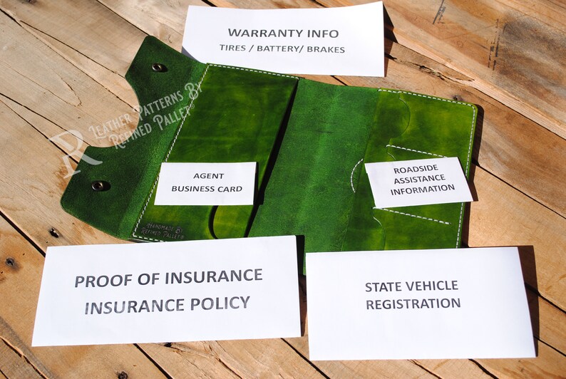 May include: Green leather wallet with multiple pockets for storing car documents. The wallet has pockets for an insurance card, registration, roadside assistance information, and an agent business card. The wallet is labelled "Leather Patterns by Refined Pallet".