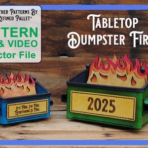 May include: Two leather craft patterns for a tabletop dumpster fire. The larger dumpster is green with a yellow "2025" label. The smaller dumpster is blue with a yellow label that reads "It's fine I'm fine everything is fine". Both dumpsters have flames on top.