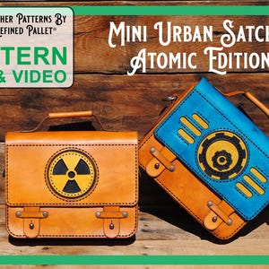 May include: Two leather satchels with a retro-futuristic design. One is orange with a yellow and black radiation symbol, the other is orange and blue with a gear design. The text "MINI URBAN SATCHEL ATOMIC EDITION" is visible.
